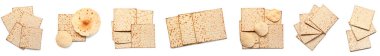 Set of Jewish flatbread matza for Passover on white background, top view