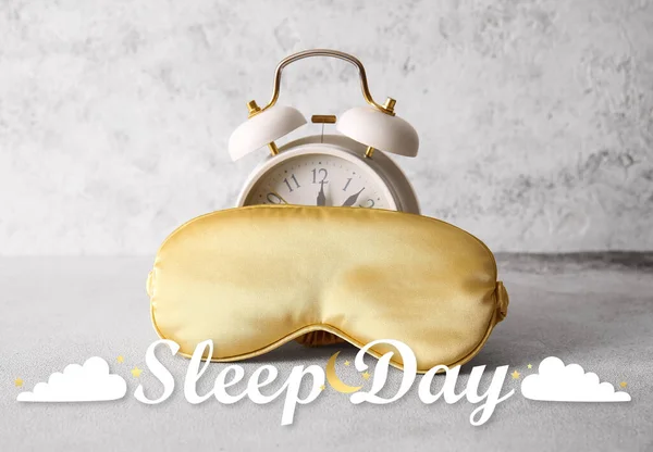 Banner for World Sleep Day with blindfold and alarm clock