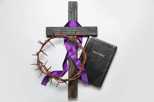 Wooden Cross Purple Ribbon Crown Thorns Holy Bible Light Background — Stock Fotó
