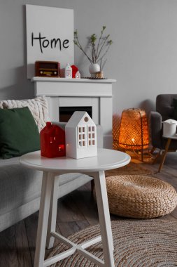 House candle holders on table in modern living room