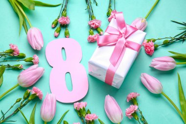 Composition with beautiful flowers, paper figure 8 and gift for Women's Day celebration on color background