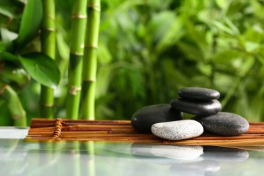 Stack of spa stones in green garden