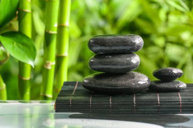 Stack of spa stones in green garden