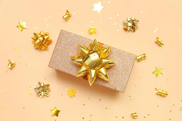 Gift Box Golden Bows Stars Beige Background — Stockfoto