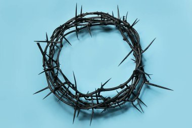 Crown of thorns on blue background