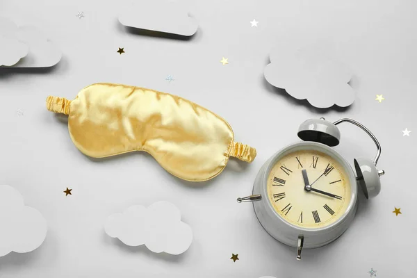 Composition Sleeping Mask Alarm Clock Paper Clouds Confetti Light Background — Φωτογραφία Αρχείου