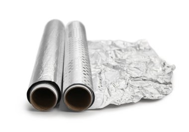 Rolls of aluminium foil on white background