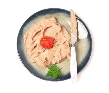 Plate with delicious pate and knife on white background