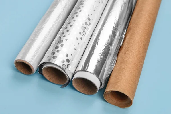 Rolls Aluminium Foil Baking Paper Food Film Color Background Closeup — Stock Photo, Image