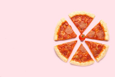 Slices of delicious pepperoni pizza and cherry tomato on pink background