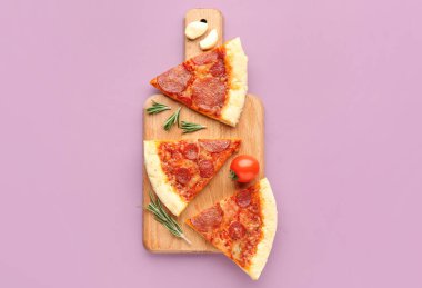 Board with slices of delicious pepperoni pizza, tomato and rosemary on lilac background