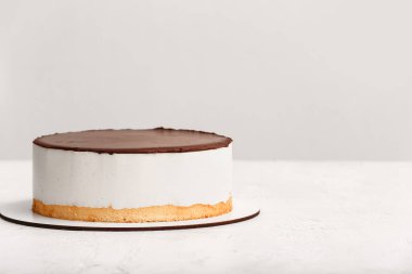 Tasty birds milk cake on light table