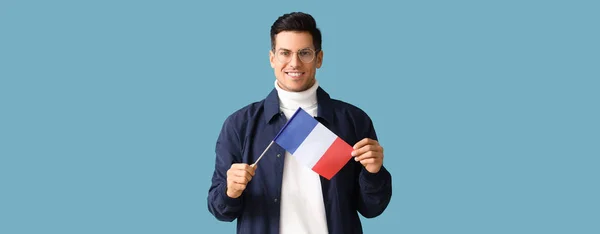 Joven Guapo Con Bandera Francia Sobre Fondo Azul Claro — Foto de Stock