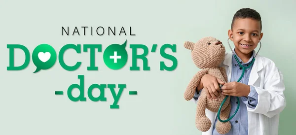 Kartka Życzeniami Narodowy Dzień Lekarza Uroczym Afroamerykaninem Bawiącym Się Zabawką — Zdjęcie stockowe