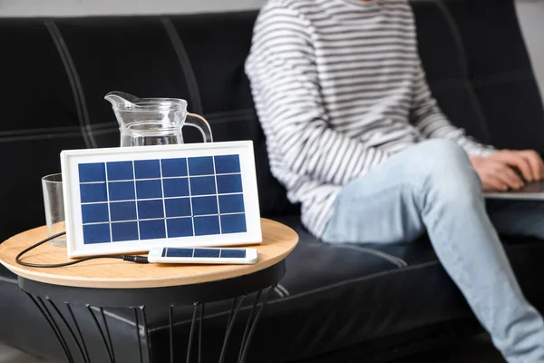 Portable Solar Panel Charging Mobile Phone Table Room Closeup — Stock Photo, Image