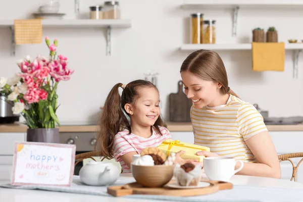 Cute Little Girl Greeting Her Mother Gift Kitchen — Stock Photo, Image