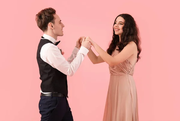 Beautiful Couple Dressed Prom Dancing Pink Background — Stock Photo, Image