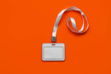 Blank badge with lanyard on color background