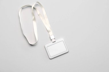 Blank badge with lanyard on light background