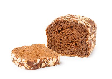 Sliced loaf of rye bread with various seeds isolated on white background