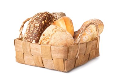 Basket with loaves of different bread isolated on white background