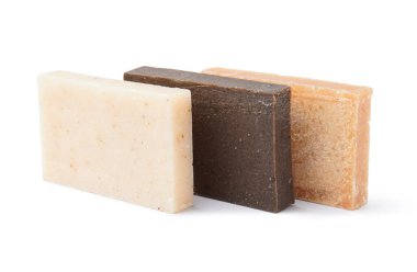 Set of natural soap bars on white background