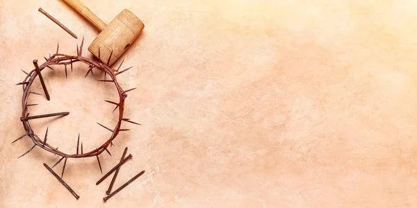 stock image Crown of thorns, nails and mallet on beige background with space for text. Good Friday concept