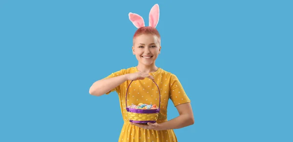 Young Woman Bunny Ears Basket Easter Eggs Blue Background — Φωτογραφία Αρχείου