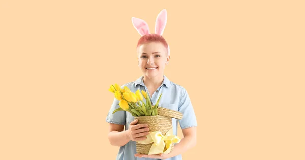 Young Woman Easter Bunny Ears Basket Tulips Beige Background — Photo