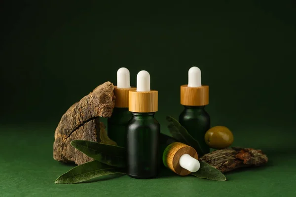 Bottles Olive Essential Oil Green Background — Stock Photo, Image