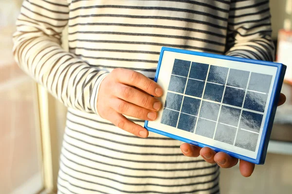 Young Man Portable Solar Panel Home Closeup — Stock Photo, Image