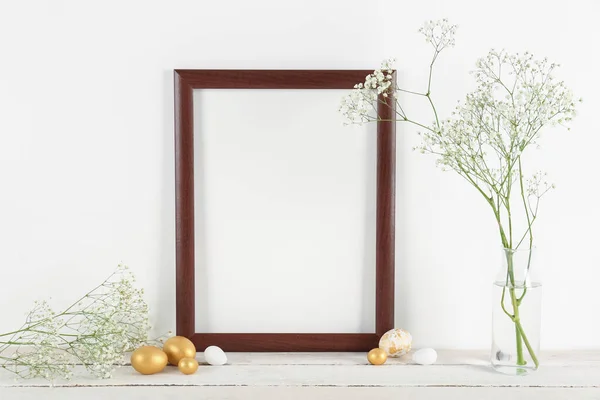 Blank Frame Vase Flowers Easter Eggs Table White Wall — Stock Photo, Image