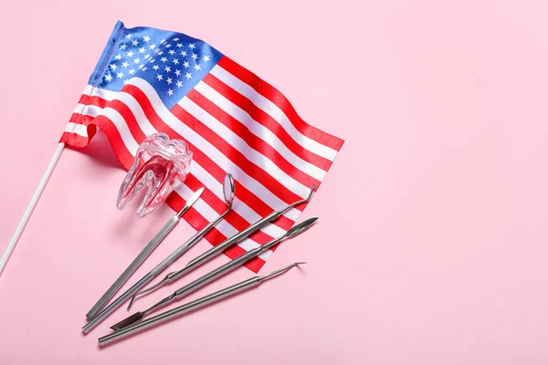 Dental Tools Plastic Tooth Usa Flag Pink Background — стоковое фото