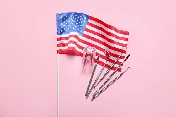 Dental Tools Plastic Tooth Usa Flag Pink Background — стоковое фото