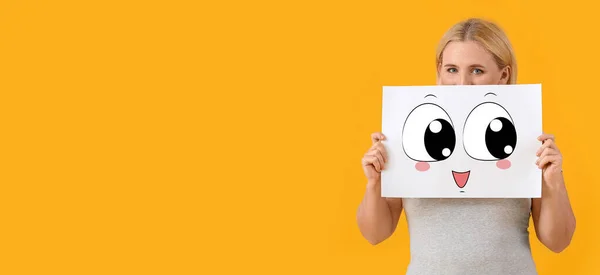 Woman Holding Paper Drawn Happy Emoticon Yellow Background Space Text — ストック写真