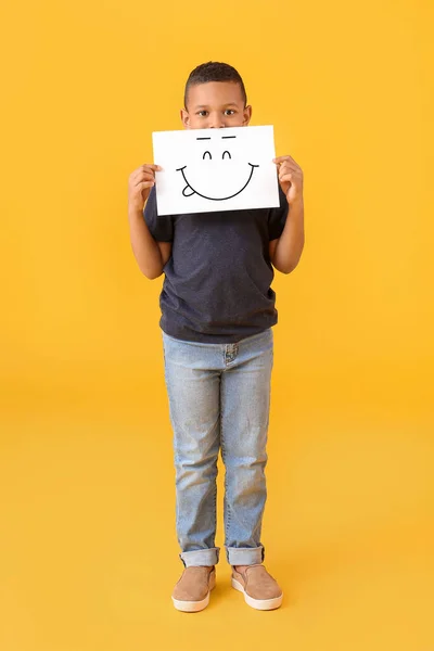 Little African American Boy Holding Paper Happy Emoticon Yellow Background — Foto Stock