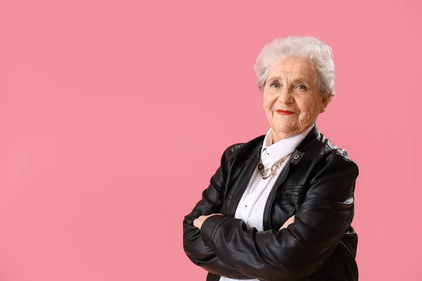 Senior Woman Leather Jacket Pink Background — Zdjęcie stockowe