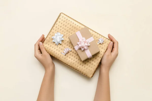 Woman Wrapped Gift Boxes Bows Light Background — Stock Fotó