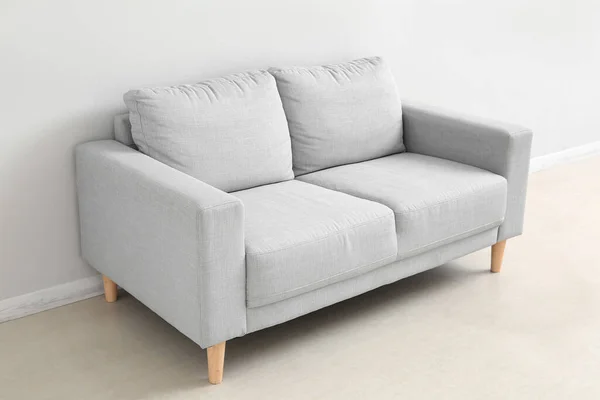 Stylish Grey Sofa White Wall — Stock Fotó