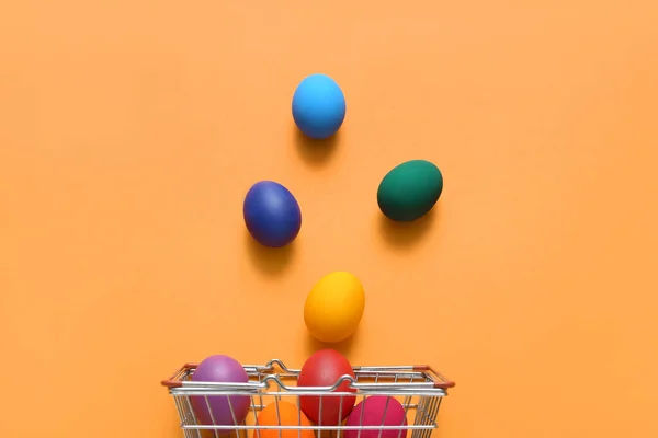 Shopping Basket Easter Eggs Orange Background — Stok fotoğraf