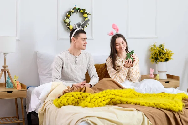Happy Young Couple Bunny Ears Easter Rabbit Bedroom — Stock fotografie