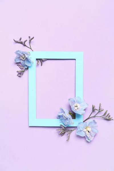 Blank Frame Beautiful Delphinium Flowers Lilac Background — 스톡 사진