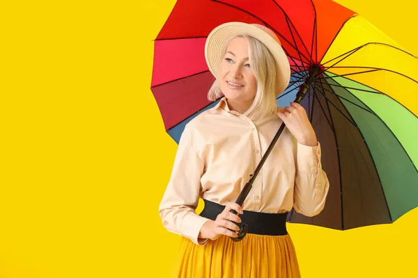 Beautiful Mature Woman Rainbow Umbrella Yellow Background — Stock Photo, Image