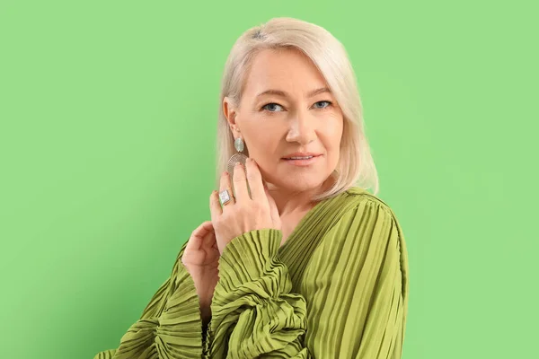 Stylish Blonde Mature Woman Beautiful Accessories Green Background — Stockfoto