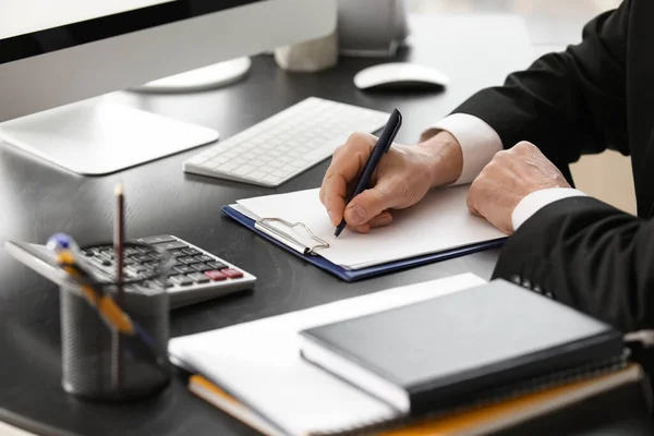 Mature Accountant Writing Notebook Table Closeup — Stock Photo, Image