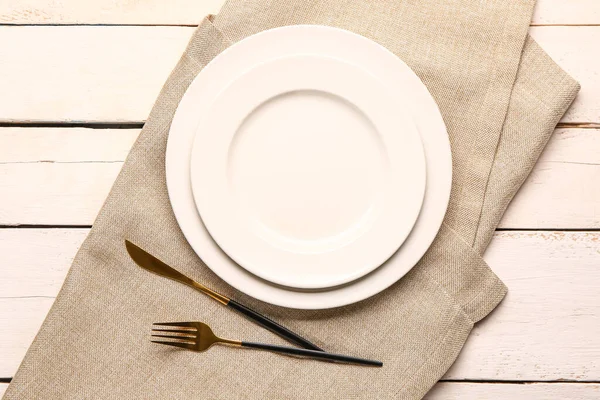 Grey Tablecloth Plates Fork Knife White Wooden Background — Stock Photo, Image