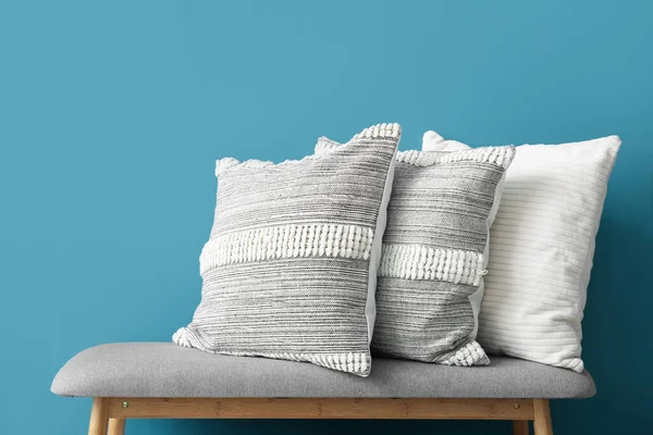 Stylish Decorative Pillows Bench Blue Wall — Stock Photo, Image