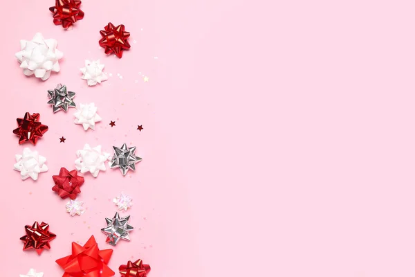 Schleifen Aus Bändern Und Sternen Auf Rosa Hintergrund — Stockfoto