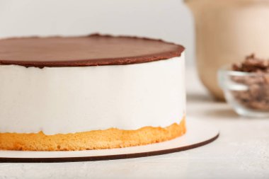 Tasty birds milk cake on light table, closeup