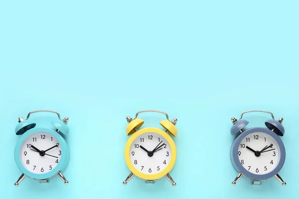 Alarm Clocks Blue Background — Stockfoto